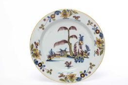 A DELFTWARE CHARGER LONDON IN THE MANNER OF LIVERPOOL, C.1770 painted in the Fazackerly palette with
