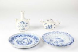FOUR BLUE AND WHITE TIN-GLAZED ITEMS 18TH CENTURY comprising: two dishes painted with Chinese