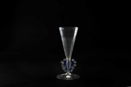 A FACON DE VENISE 'WINGED' WINE FLUTE 17TH CENTURY the tall conical bowl above a hollow inverted