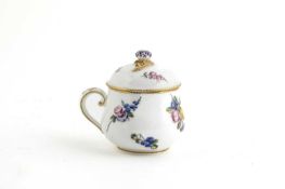 A VINCENNES POT A JUS AND COVER DATE CODE FOR 1755 with a flower finial and painted with colourful