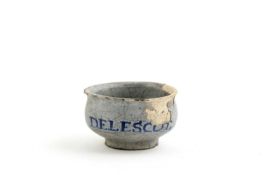 A DELFTWARE OINTMENT POT ENGLISH, C.1700-20 of footed ovoid form, inscribed in blue 'DELESCOT.' 5.
