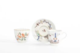 A CHELSEA FLUTED BEAKER OR TEABOWL C.1755 AND LATER later painted with flower sprays, together