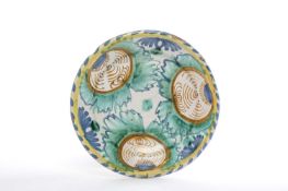 A DELFTWARE CHARGER ENGLISH, LATE 17TH CENTURY painted with three large orange fruit, probably