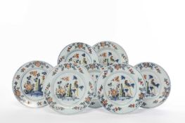 A SET OF SEVEN DELFTWARE PLATES LAMBETH, C.1750 each painted in polychrome enamels with parrots