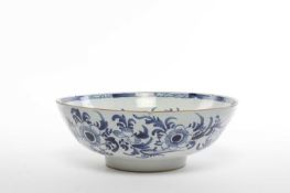 A DELFTWARE PUNCH BOWL ENGLISH, 18TH CENTURY blue painted with scrolling flowering foliage 30.2cm