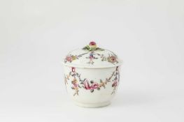 A MENNECY SUGAR BOWL AND COVER C.1760 the domed cover with a fruit and leaf knop and delicately