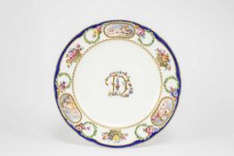 A SEVRES PLATE FROM A SERVICE FOR MADAME DU BARRY THE PORCELAIN C.1772-73 BUT LATER DECORATED with a