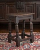 A Charles I oak joint stool, circa 1640