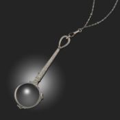 AN EARLY 20TH CENTURY DIAMOND-SET PAIR OF LORGNETTES AND CHAIN