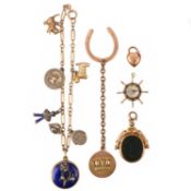 A GOLD CHARM BRACELET, TWO LOOSE CHARMS AND A CHAIN,
