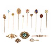 TEN STICKPINS AND FIVE BROOCHES, 19TH CENTURY AND LATER