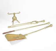 Christopher Dresser (1834-1904) A set of Aesthetic Movement brass fire irons, circa 1880