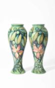 Sally Tuffin for Moorcroft Pottery, A pair of Rainforest vases, 1994