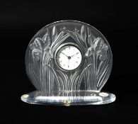 Lalique; An Iris clock, circa 2003 clear and frosted glass moulded with flowers