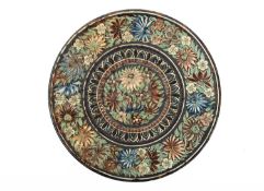 Bombay School of Art, A Wonderland pottery charger, circa 1880