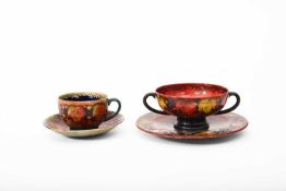 Walter Moorcroft (1917-2002) for Moorcroft Pottery, A Flambe Leaf and Berries twin-handled cup