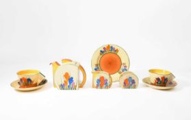 Clarice Cliff (1899-1972) A Crocus pattern early morning breakfast set, circa 1932