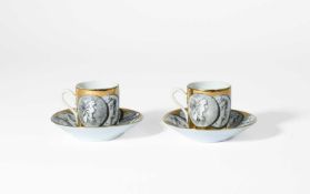 Piero Fornasetti (1913-1988) A rare pair of Cammei espresso cups and saucers, circa 1950