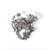 Arno Malinowski (1899-1976) for Georg Jensen; A silver Lamb and Ivy brooch