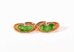 Archibald Knox (1864-1933) for Liberty and Co. An Arts and Crafts silver and enamel stick brooch