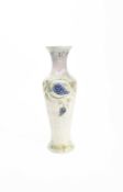 William Moorcroft (1872-1945) for Moorcroft Pottery; A Grape Vine pattern tall vase