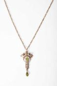 Art Nouveau; A 9ct gold pendant necklace, circa 1910