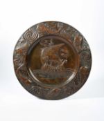 John Pearson (1859-1930) A large Arts and Crafts repousse copper charger, 1896