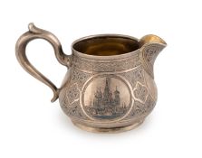 A mid-19th century Russian silver and niello cream jug,