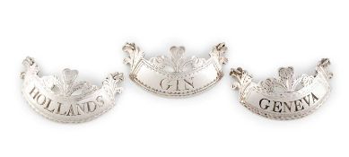 A matched set of three George III silver wine labels,