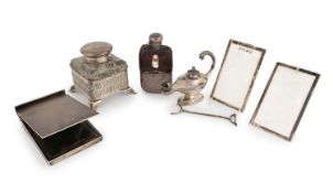 λ A collection of silver desk items,