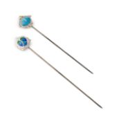 Two Edwardian Arts & Crafts silver and enamel hat pins,