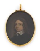 A large Commonwealth gold locket with a miniature,