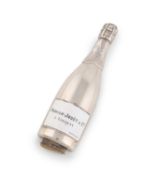 A late-Victorian novelty silver and enamel champagne bottle stamp moistener,