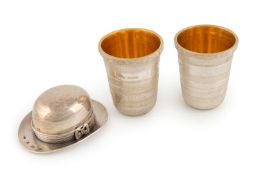 A novelty modern silver hat box,