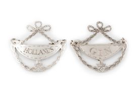 A pair of George III silver wine labels,