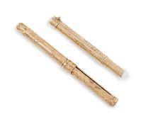 A gold and gilt metal combination dip pen and pencil,