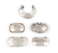 A collection of antique silver wine labels,