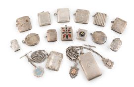 A large collection of antique silver vesta cases,