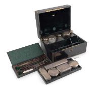 A 19th century French silver-mounted travelling dressing table set,