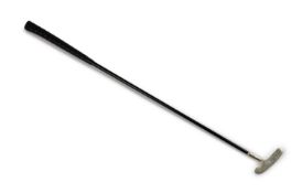 A modern silver headed golf putter,