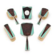 λ An Art Deco silver-mounted tortoiseshell and enamel dressing set,