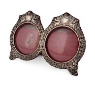 An Edwardian silver-mounted double photograph frame,
