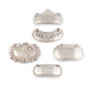 A collection of antique silver wine labels,