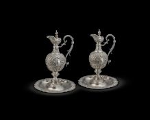 A matched monumental pair of modern Italian silver ewers on stands/basins,