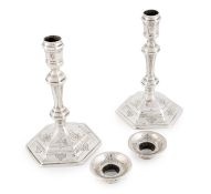 A matched pair of George I Britannia standard silver candlesticks,