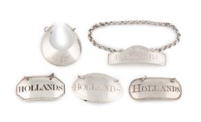 A collection of George III silver wine labels,