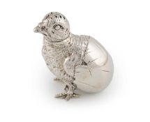 An Edwardian novelty silver chick pepper pot,