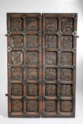 A PAIR OF INDIAN TEAK DOORS