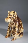 AN EARTHENWARE FIGURE OF A BEAR