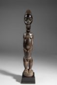 A BAULE STANDING MALE FIGURE